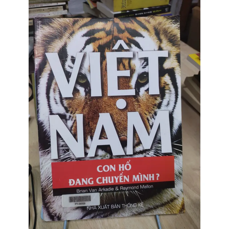 Sách: Việt Nam - con hổ đang chuyển mình - TG: Brian Van Arkadie & Raymond Mallon 795786