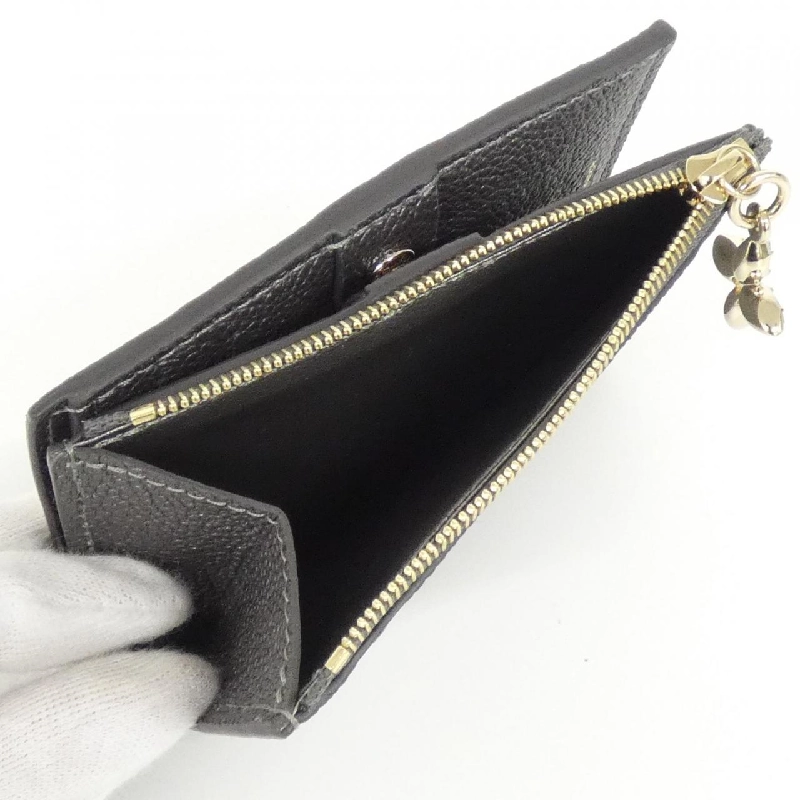 Ví Louis Vuitton Monogram Empreinte (LV SKI) Porte-feuille Lisa M12536 621662