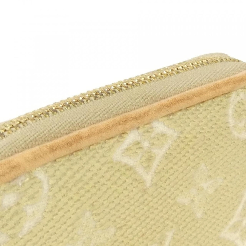 Ví tiền xu Louis Vuitton Monogram Laminated Jacquard Zippy M82483 621295