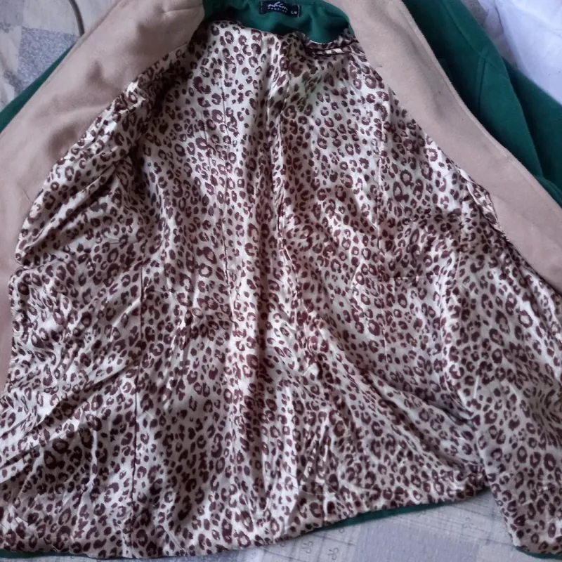 Áo dạ,size L,tình trạng còn mới 931137