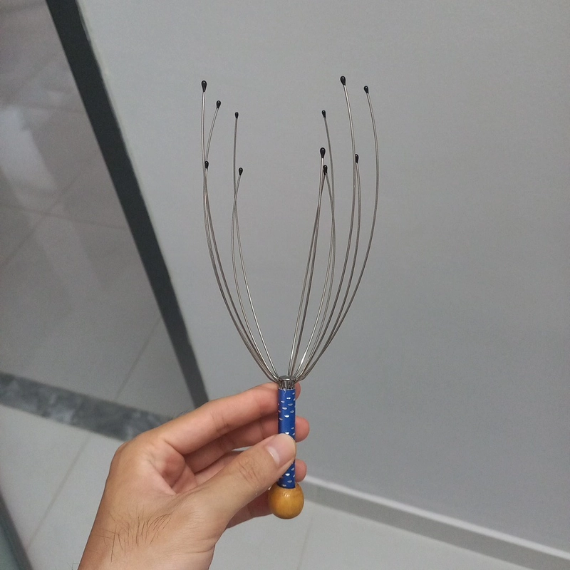dụng cụ mát xa đầu  494291