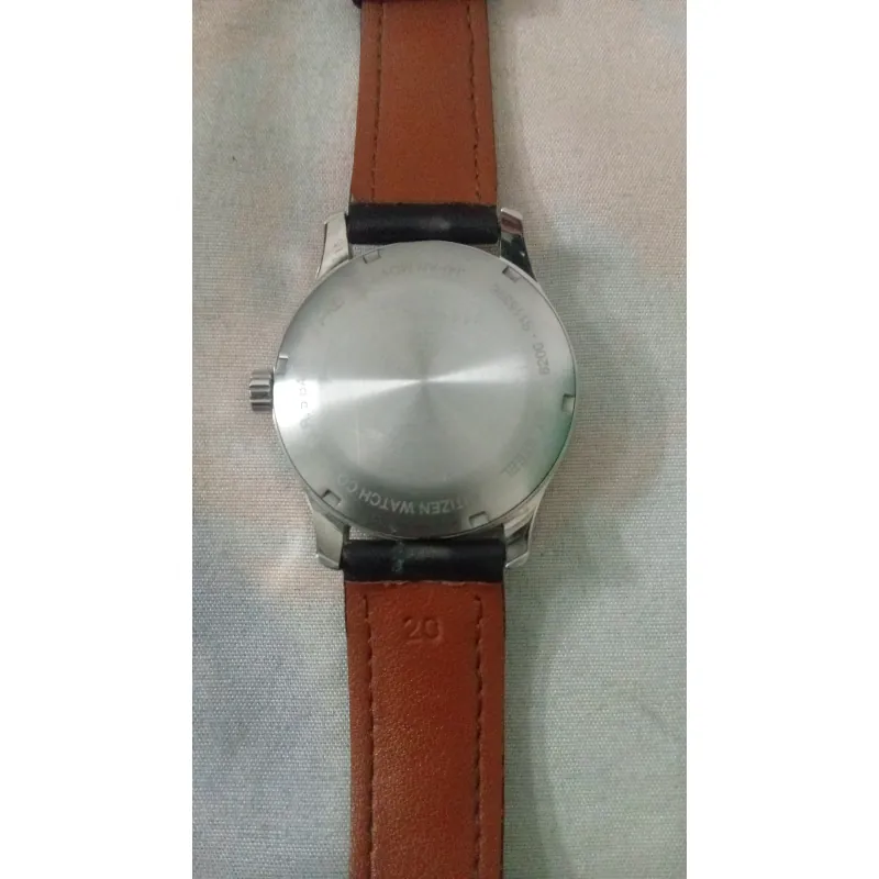 Đồng hồ nam dây da nâu mặt trơn kim loại sáng bóng 699291