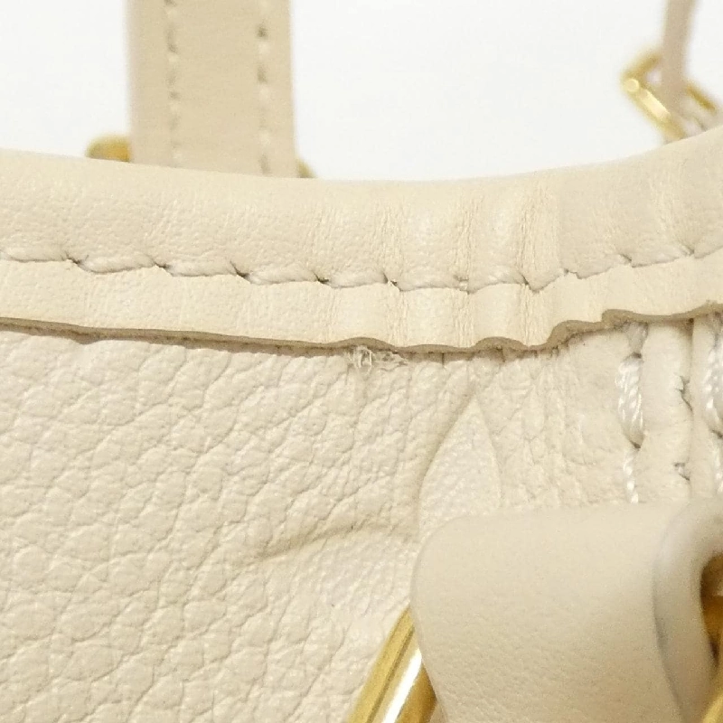 Túi xách Louis Vuitton Monogram Empreinte Babylon Tote PM M11394 610353