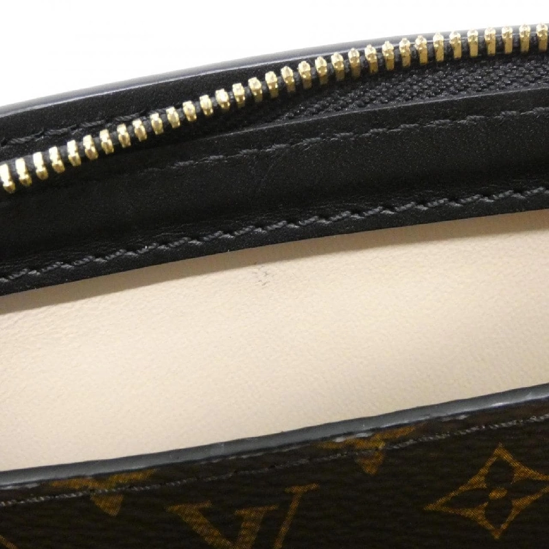 Túi xách đeo vai Louis Vuitton Monogram Reverse Trunk Clutch M43596 612081