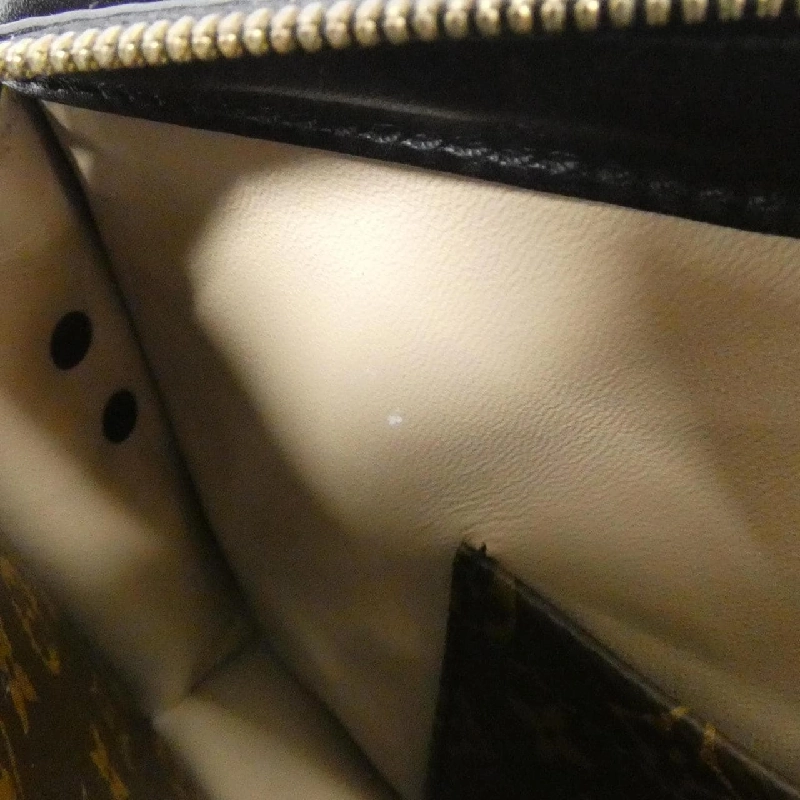 Túi xách đeo vai Louis Vuitton Monogram Reverse Trunk Clutch M43596 611739