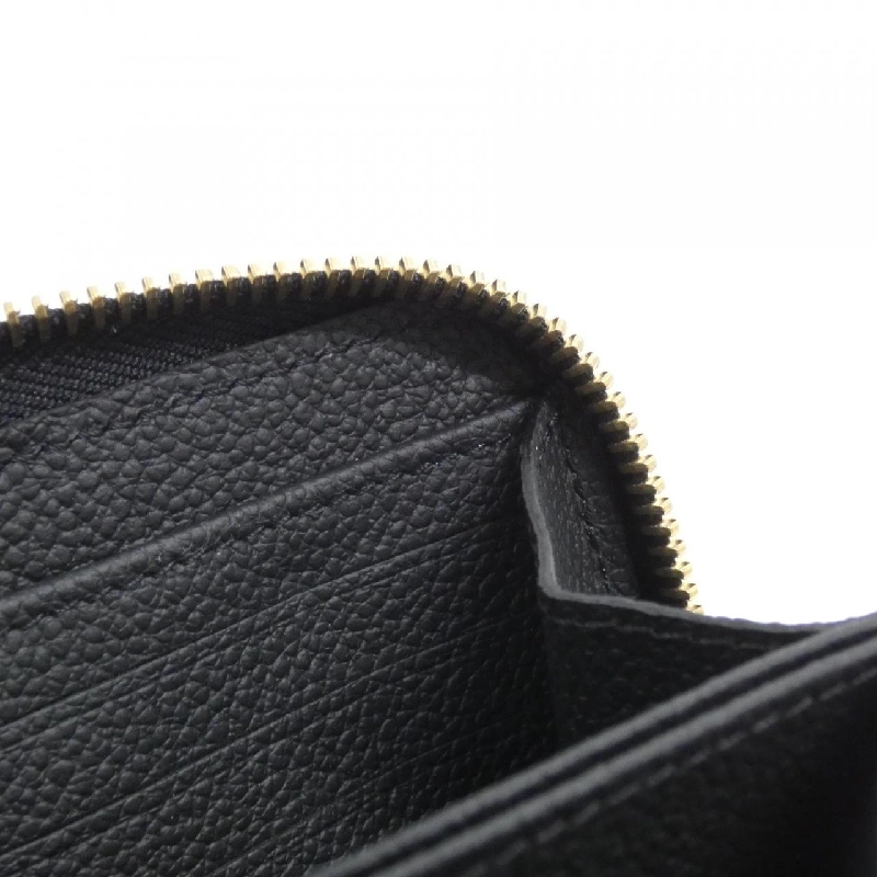 Ví Zippy Monogram Empreinte Hai Màu Louis Vuitton M80481 621798