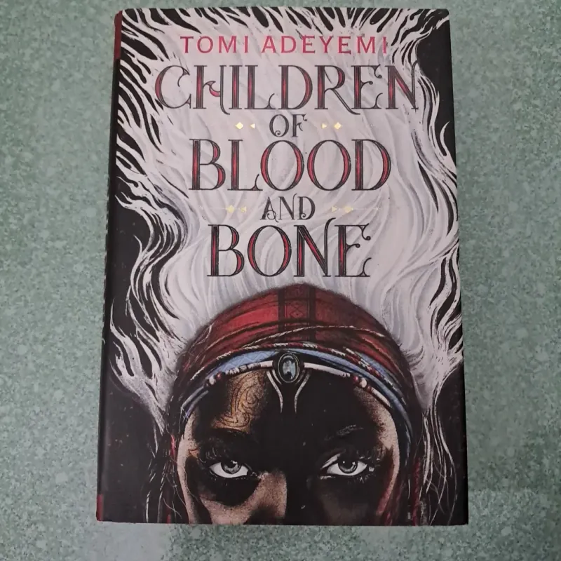 Chidren of blood anh bone- tomi adeyemi 997273