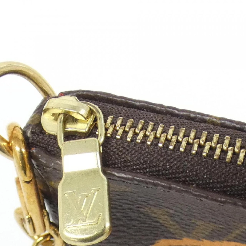 Túi đeo chéo mini Louis Vuitton Monogram (Holiday) M63830 - Hàng hiệu Authentic 769351