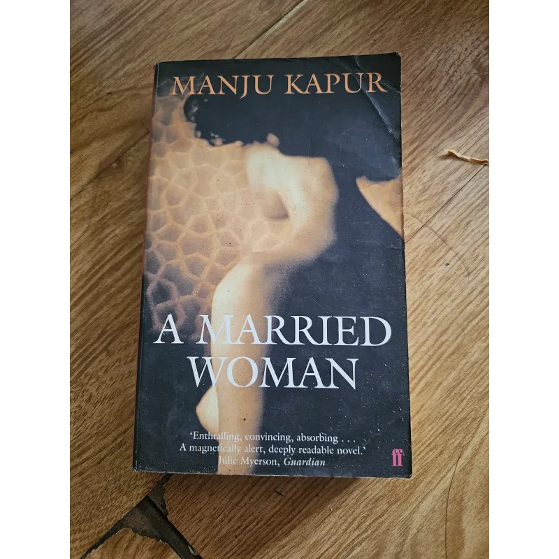 A Married Woman (ố vàng nặng)
 757803