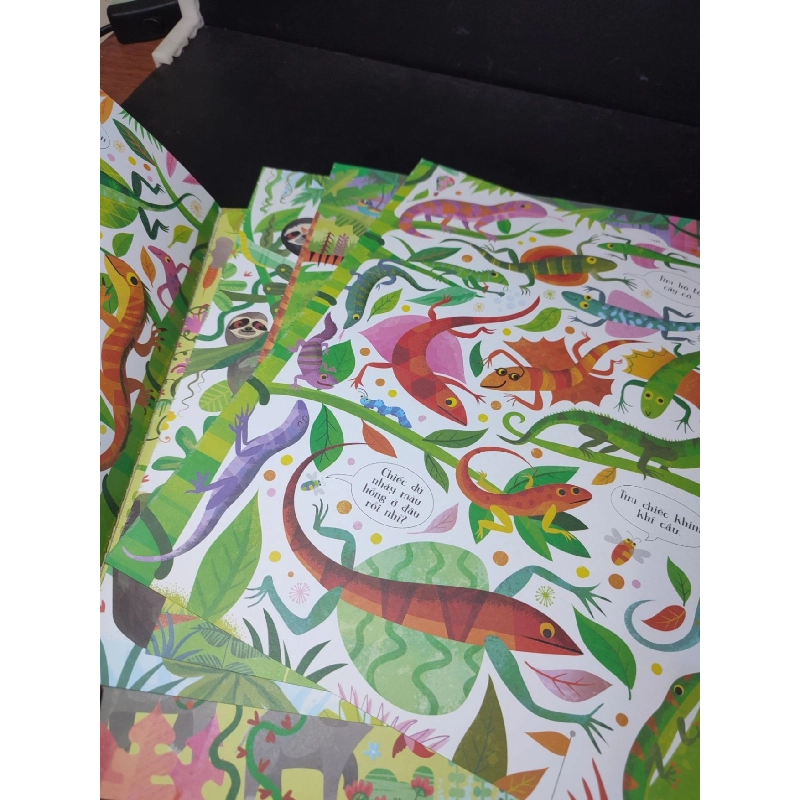 Tinh mắt bắt hình rừng rậm mới 50% rách trang , bẩn HCM0311 912306