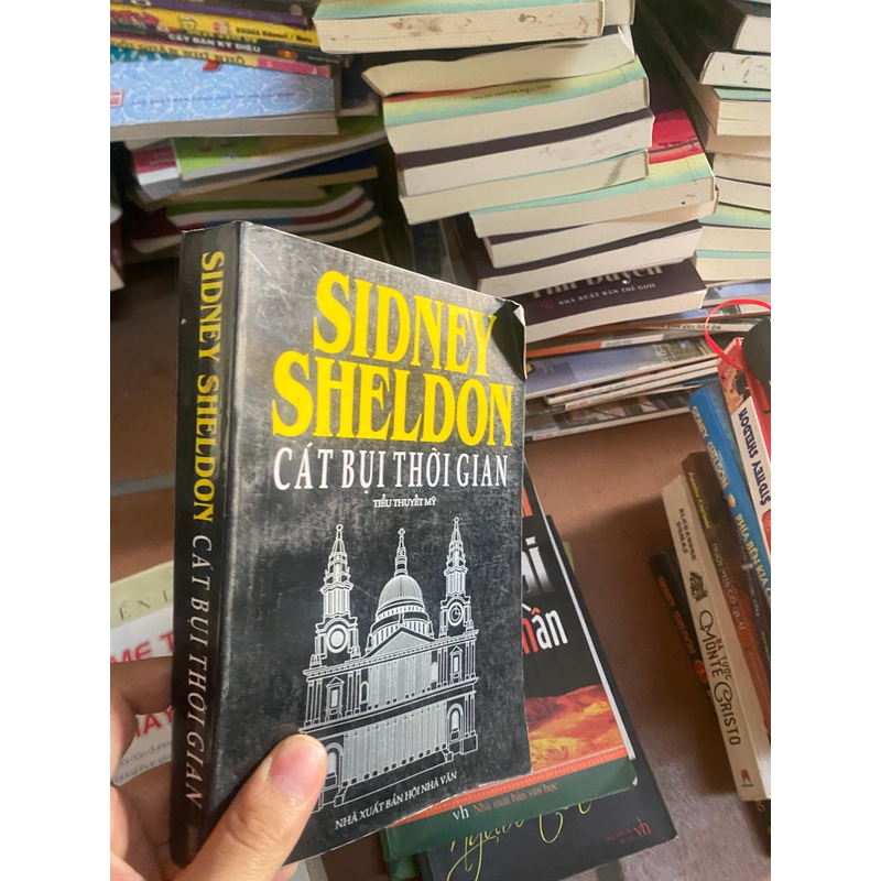 Sách cát bụi thời gian - Sidney Sheldon 312102