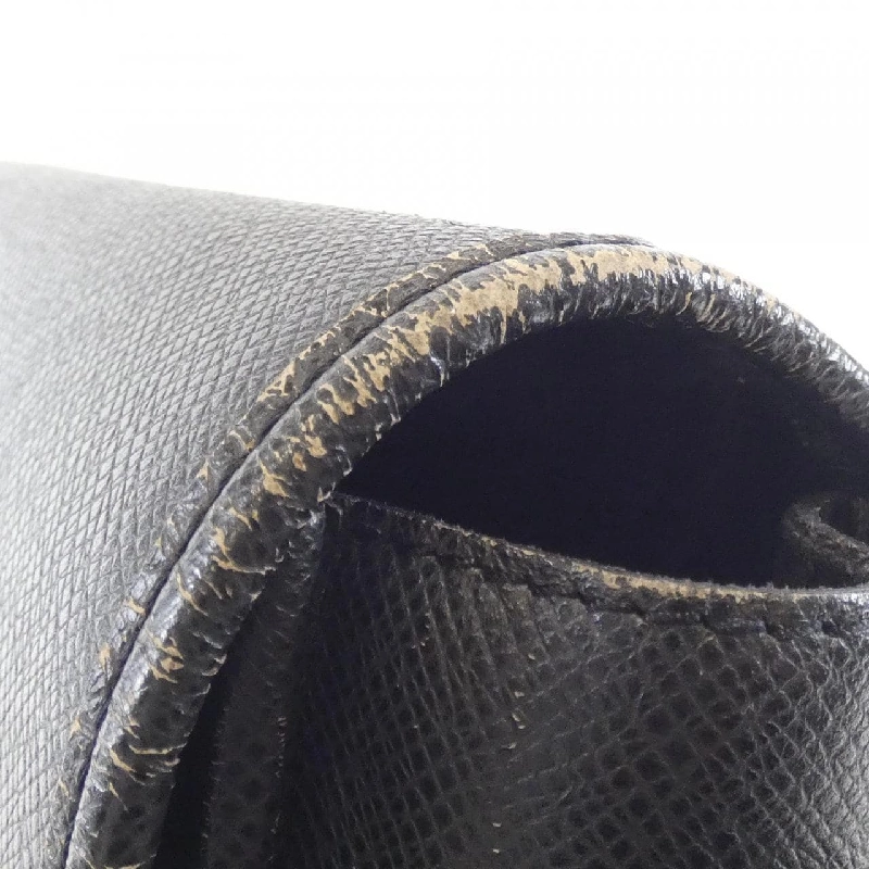 Túi xách vai Louis Vuitton Taiga Andre M32482 609664