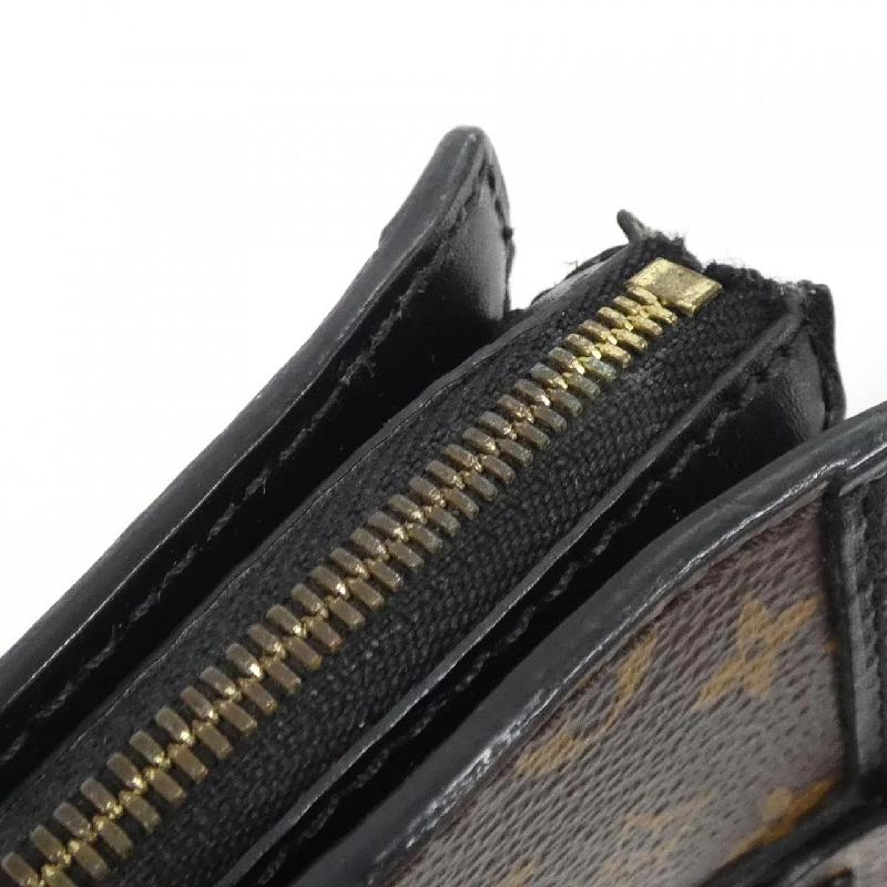 Túi xách đeo vai Louis Vuitton Monogram Reverse Trunk Clutch M43596 611739