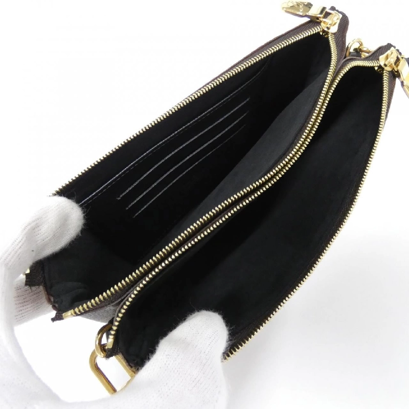 Túi đeo vai Louis Vuitton Monogram Giant Pochette Double Zip M69203 611400