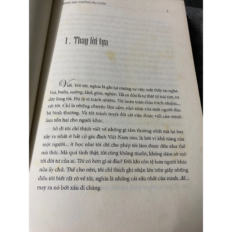 Đằng sau những nụ cười- Khánh Ly - Bìa cứng, mới 85% 777826