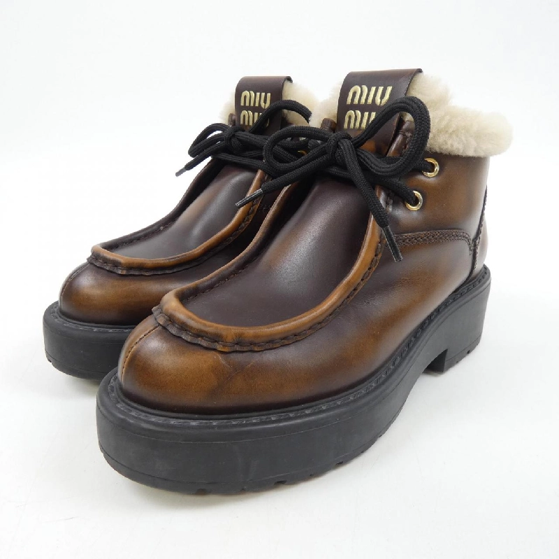 Giày bốt MIU MIU 662386