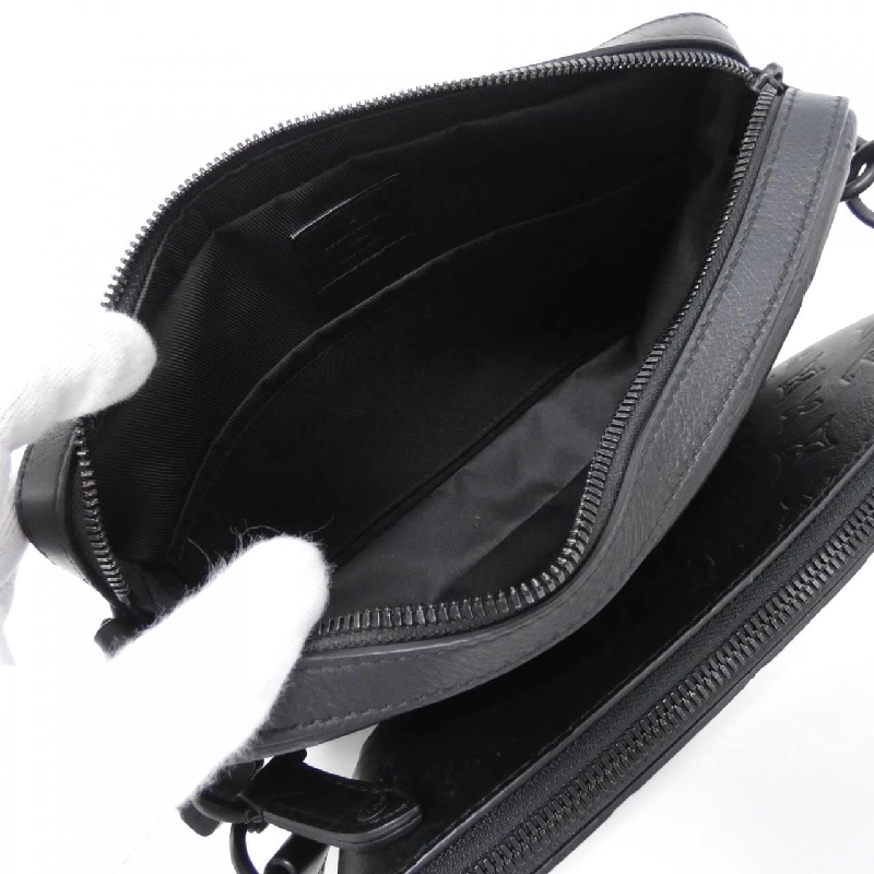 Túi đeo chéo Louis Vuitton Monogram Shadow Trio M46602 610422