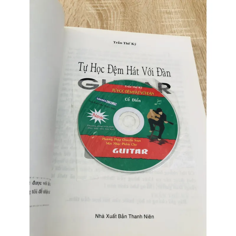 TỰ HỌC ĐỆM HÁT VỚI ĐÀN GUITAR ( kèm đĩa CD) 975831