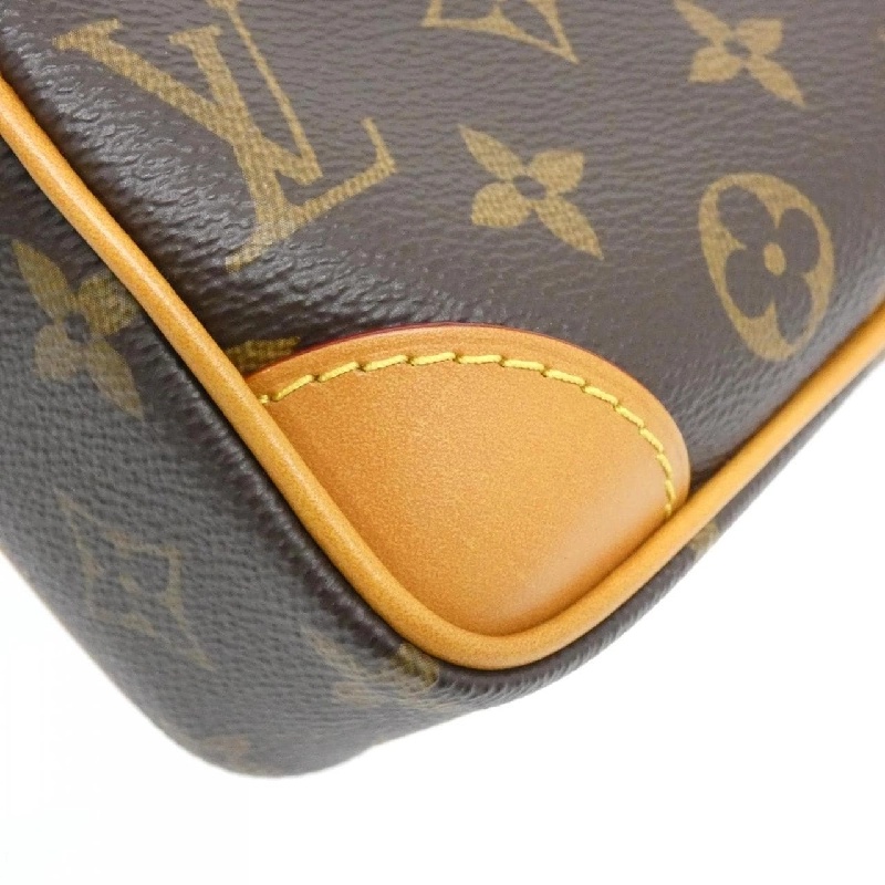 Túi đeo vai Louis Vuitton Monogram Archive Trocadéro Wearable Wallet M14058 609523