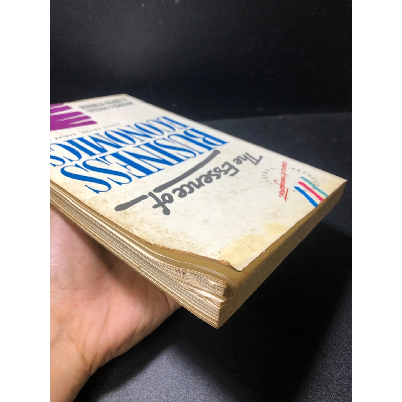 The essence of business economics mới 70% có mộc đỏ và viết đầu sách HCM1611 912361