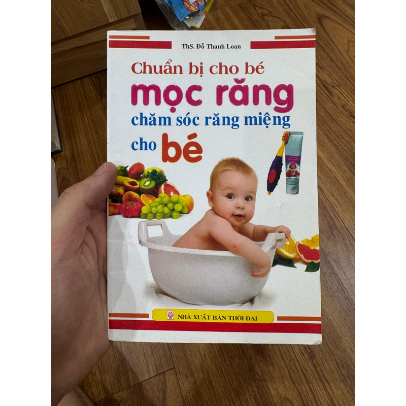 Bé mọc răng 551934