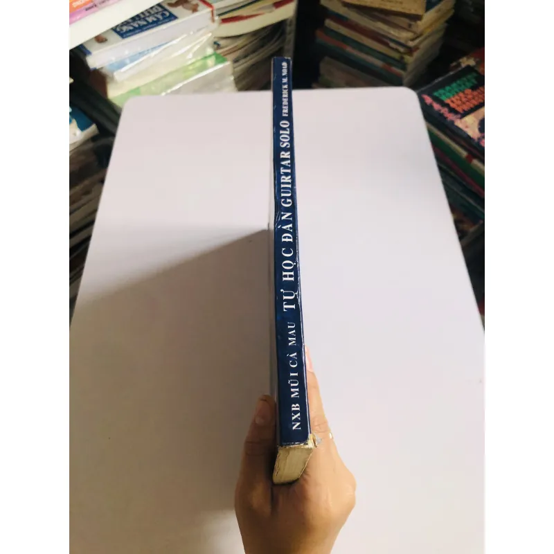 TỰ HỌC ĐÀN GUITAR SOLO (T1) 777982