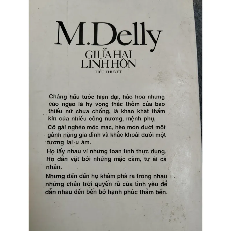 GIỮA HAI LINH HỒN - M.DELLY 574348