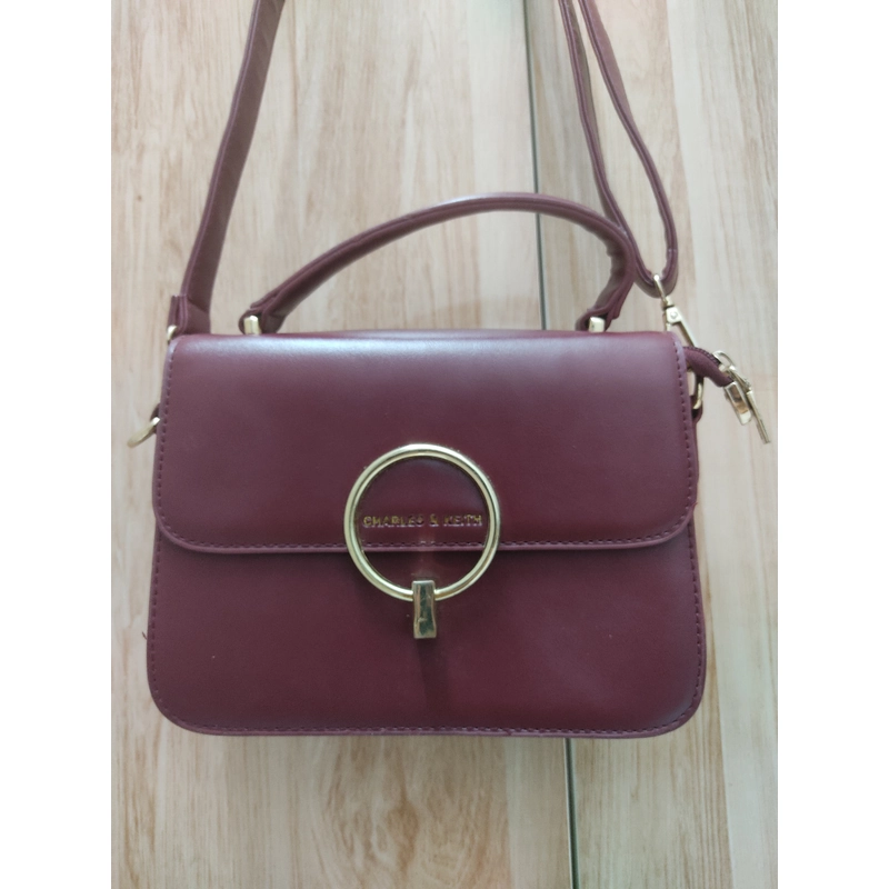 Túi sách CK đỏ rượu mới 80% 503641