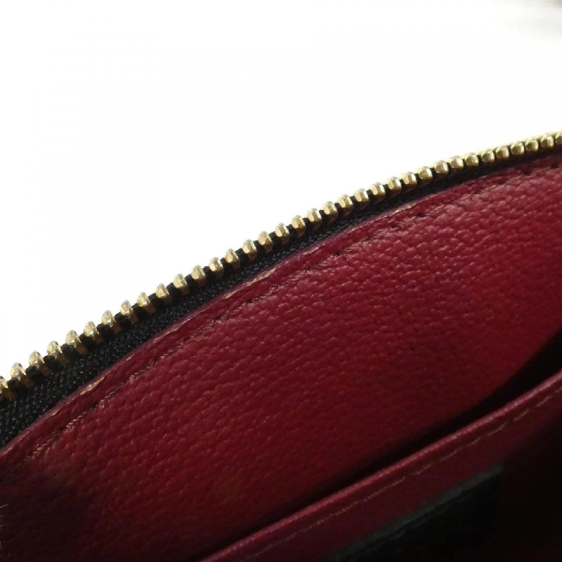 Túi xách Louis Vuitton Monogram Empreinte Bicolor Cosmetic Pouch PM M59086 - Hàng hiệu Chính hãng 772531