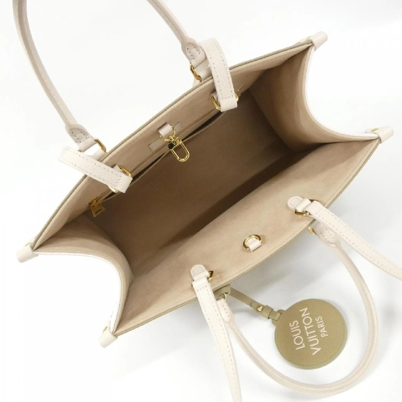 Túi xách Louis Vuitton Monogram Empreinte (Spring in the City) OnTheGo 2022SS MM M46060 - Hàng hiệu Chính hãng 764642