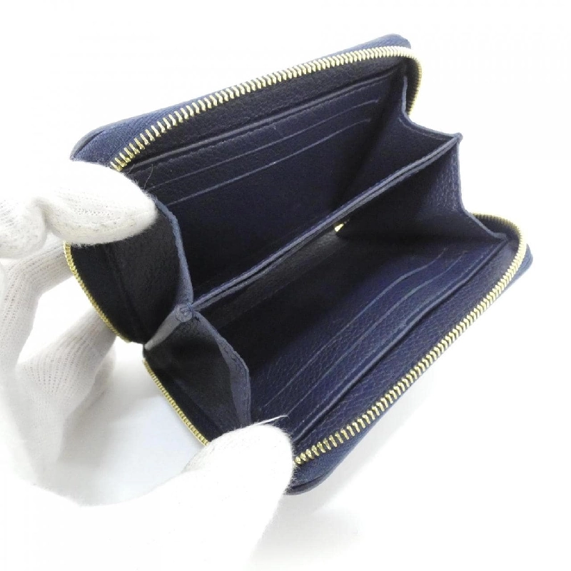 Ví tiền xu Louis Vuitton hai màu Monogram Empreinte Zippy M83606 - Hàng hiệu Chính hãng 769569