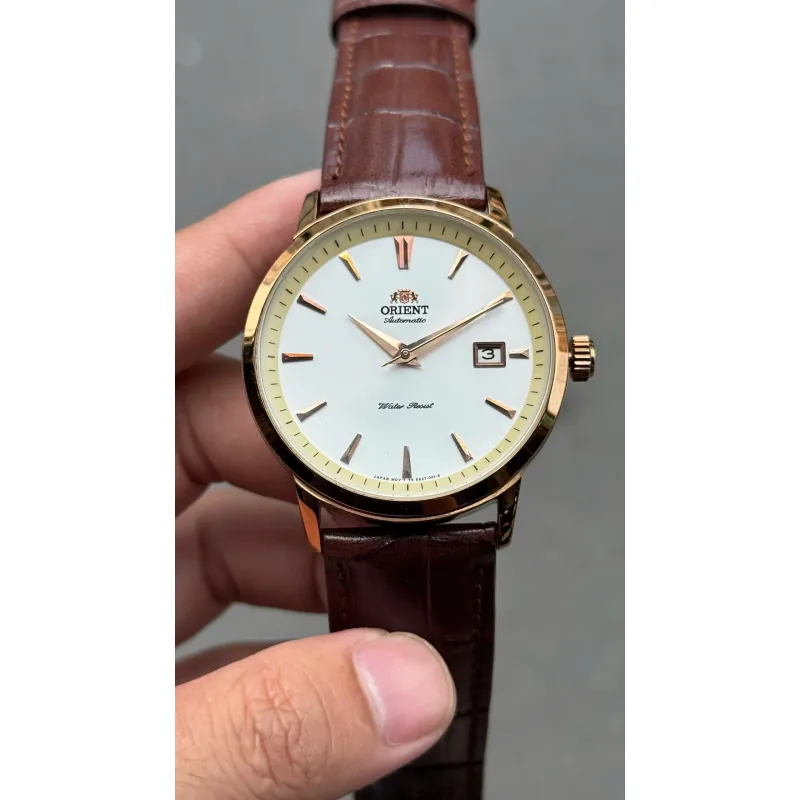 Đồng hồ Orient chính hãng, mặt tròn, dây da nâu, kim loại mạ vàng, phong cách cổ điển 706667