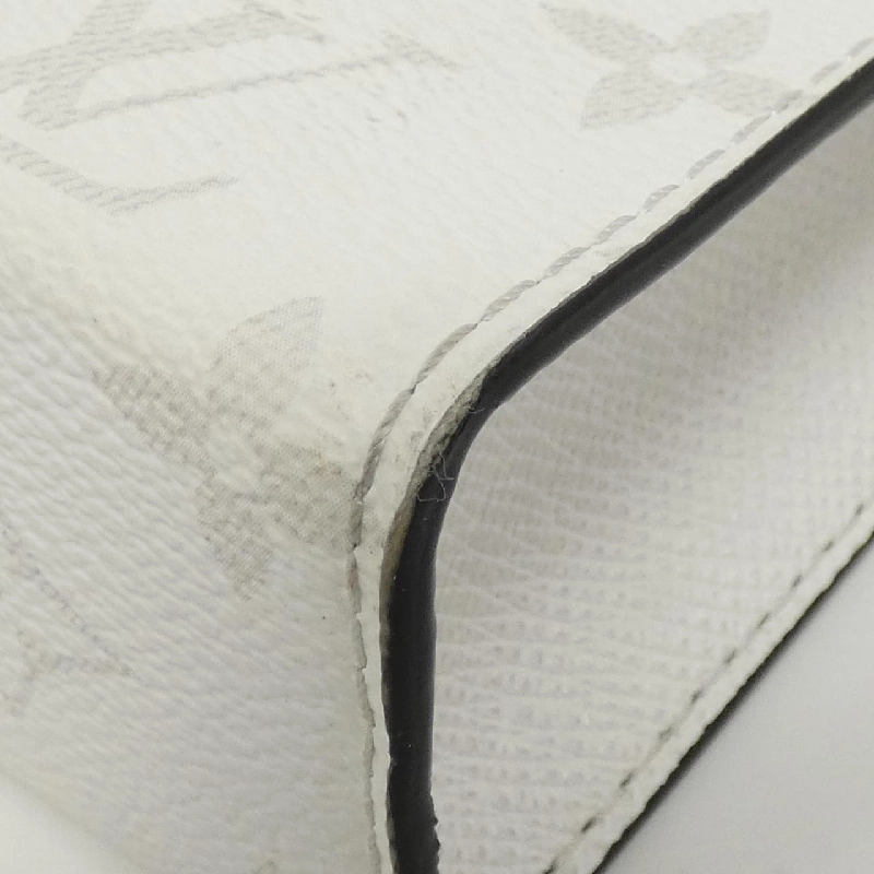 Túi đeo vai Louis Vuitton Taiga Rama Gaston Wearable Wallet M30935 613686