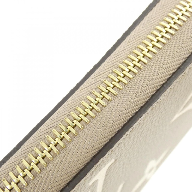 Ví Zippy Monogram Empreinte Hai Màu Louis Vuitton M69794 620990