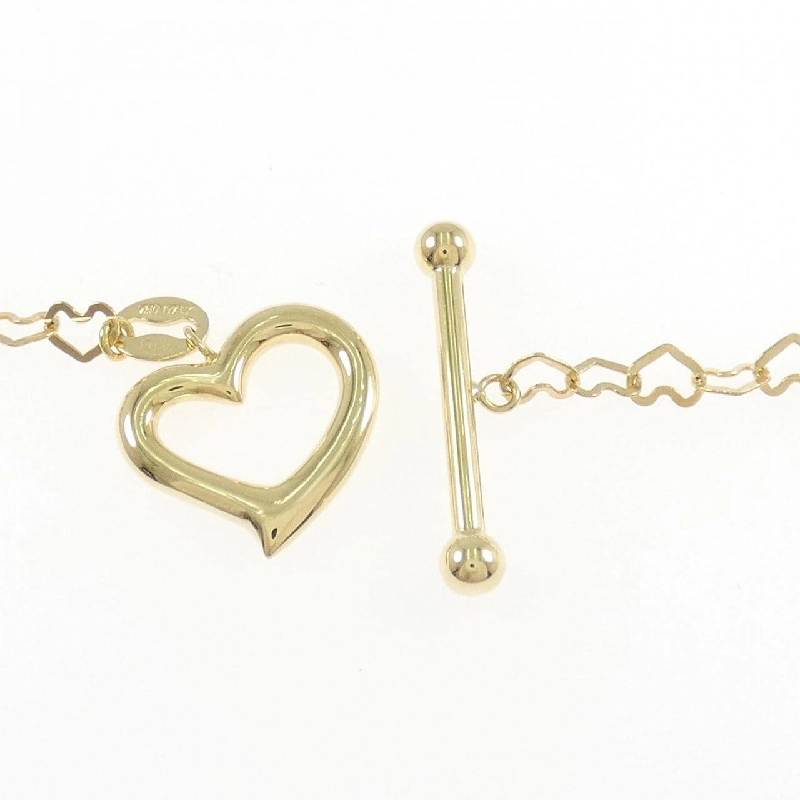 Vòng tay trái tim 750YG của UnoAere 665600