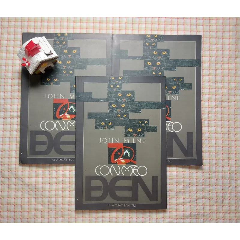CON MÈO ĐEN - JOHN MILNE 764177