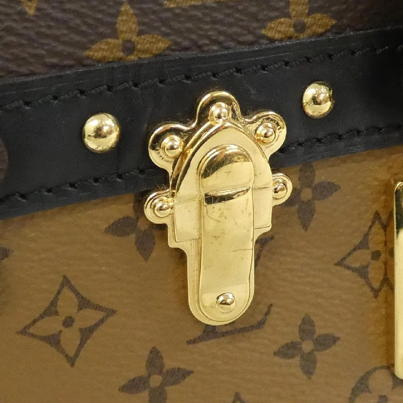 Túi xách đeo vai Louis Vuitton Monogram Reverse Trunk Clutch M43596 - Hàng hiệu Authentic 802693