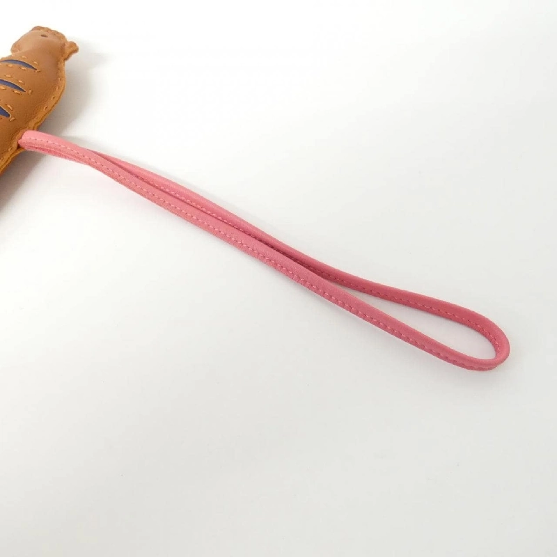 Hàng hiệu Authentic Hermès Roulou 078544CA Bag Charm 807625