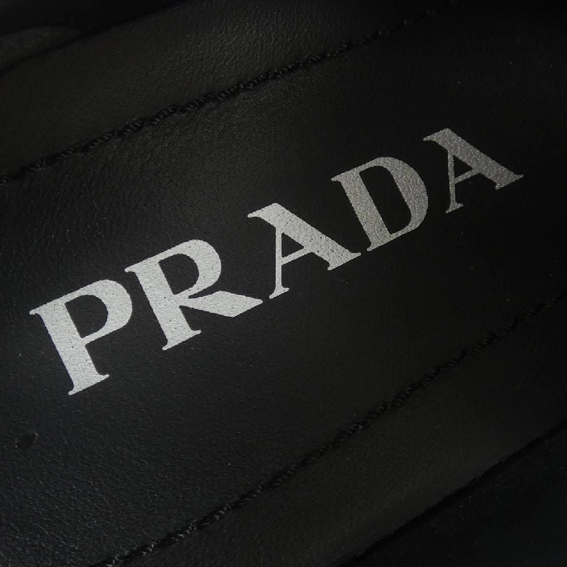 Giày lười Monolis Triangle Logo PRADA 1D649M - Hàng hiệu Authentic 829614