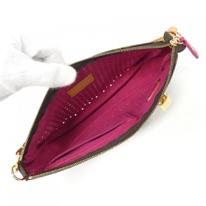 Túi đeo chéo Louis Vuitton Monogram Perforated Pochette Accessoires M95183 621105
