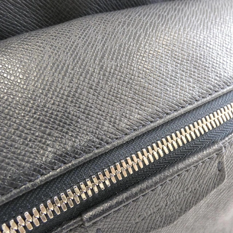 Ba lô Louis Vuitton Taiga Discovery M33451 609545