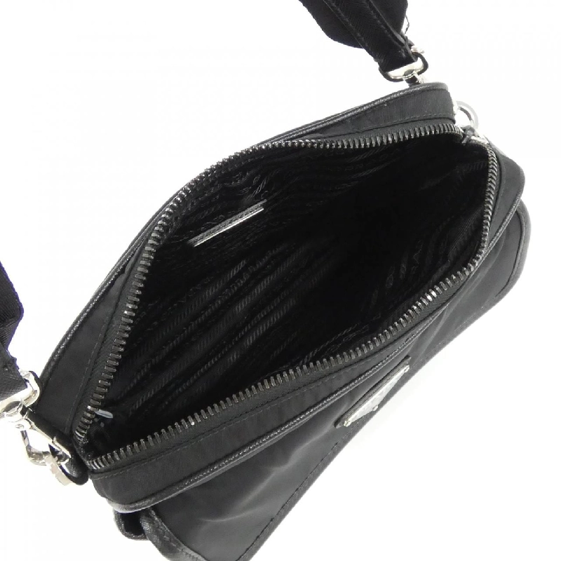 Túi đeo vai Prada 2VH133 611030