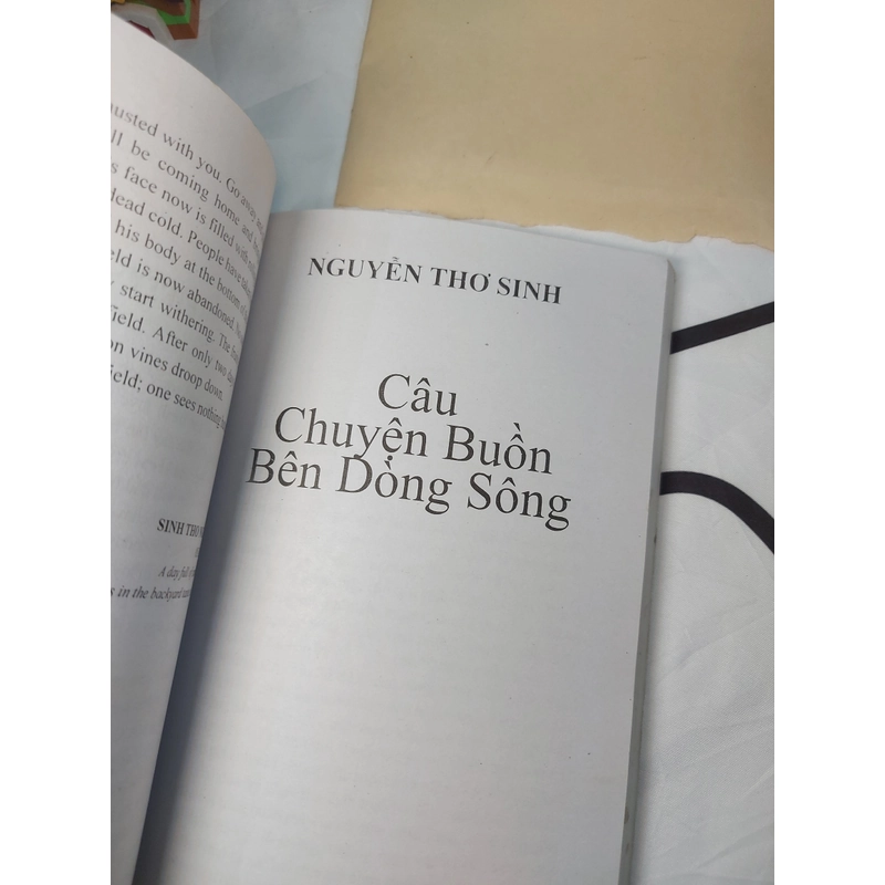 Sách song ngữ Anh - Việt - A sad story by the river 478107