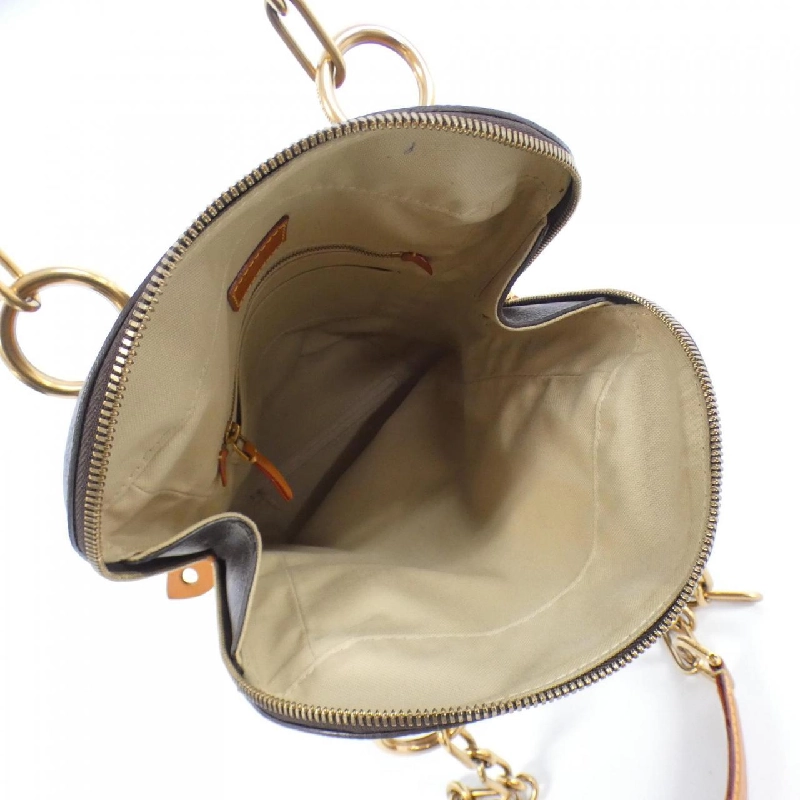 Túi xách Louis Vuitton Monogram (Iconoclast) Punching Bé M40230 613703