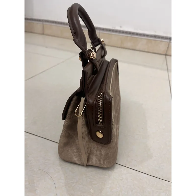 Túi Chio màu nâu 757516