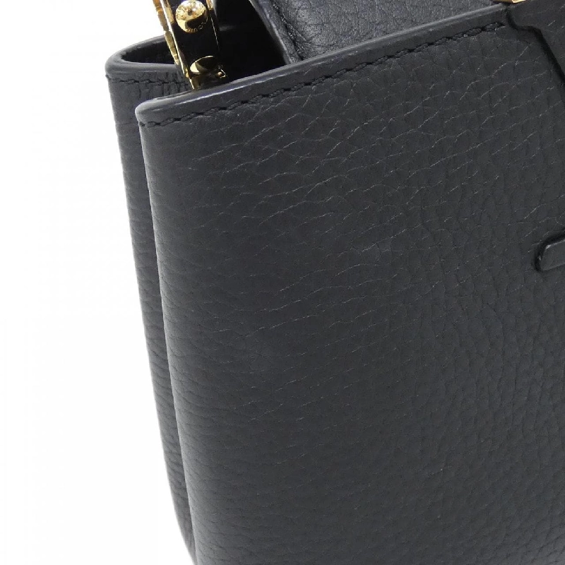 Túi Louis Vuitton Capucines MINI M56071 614385