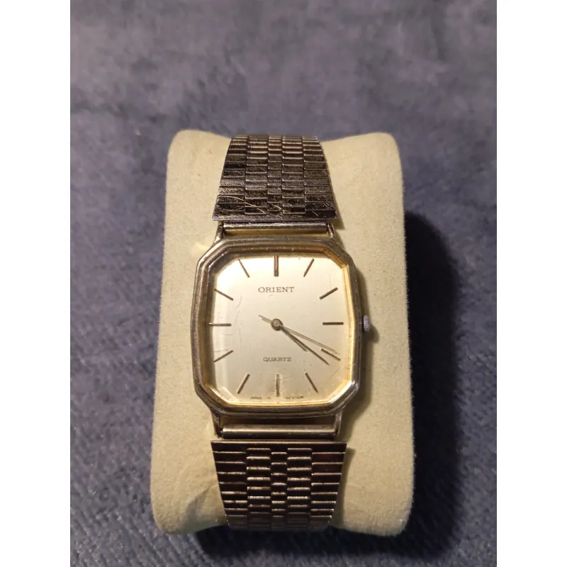 Đồng hồ si nhật bản Orient dáng tank bọc vàng cả dây khoaast 751891