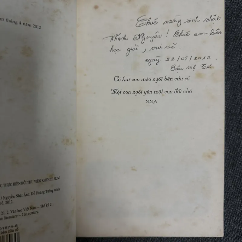 Có hai con mèo ngồi bên cửa sổ - Nguyễn Nhật Ánh 1023041