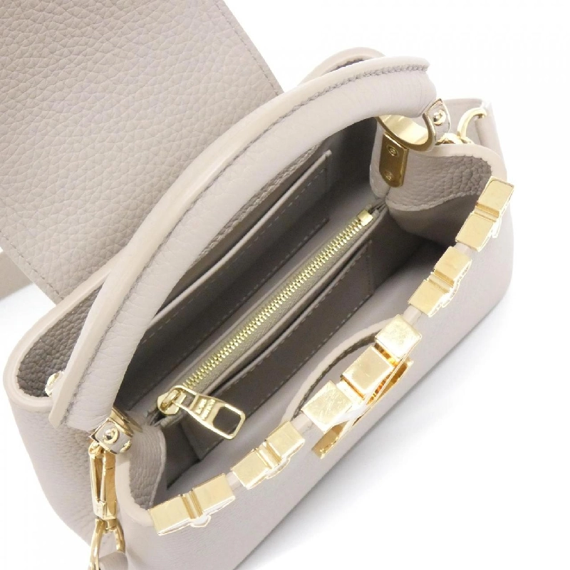 Túi Louis Vuitton Capucines MINI M11341 617332