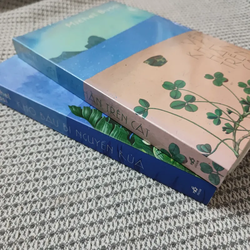 Kho báu bị nguyền rủa - Vết khắc hằn trên cát - Michel Bussi 1023836